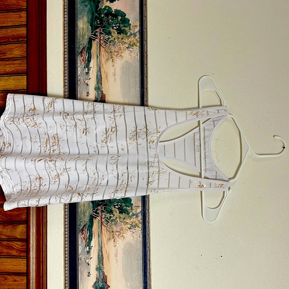 Like new white and gold Zyia Havana Tank. Only worn maybe 1 time.